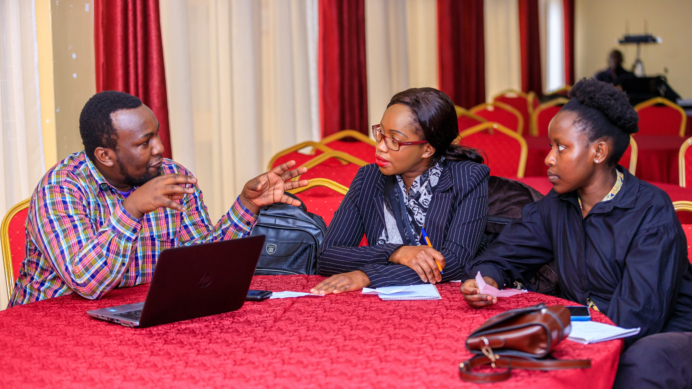 Young people in a conversation, brainstorming