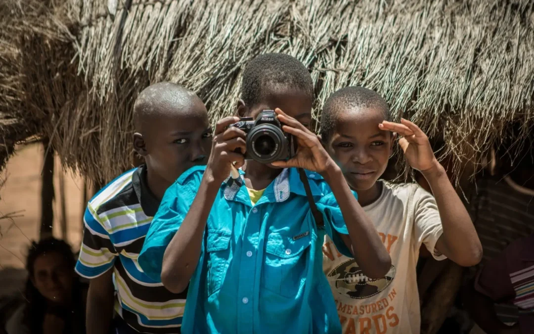 Three kids with a camera